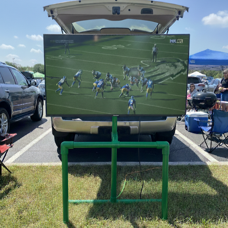 Portable outdoor TV stand, ground resting design, supports 55-inch screen, available in multiple team colors