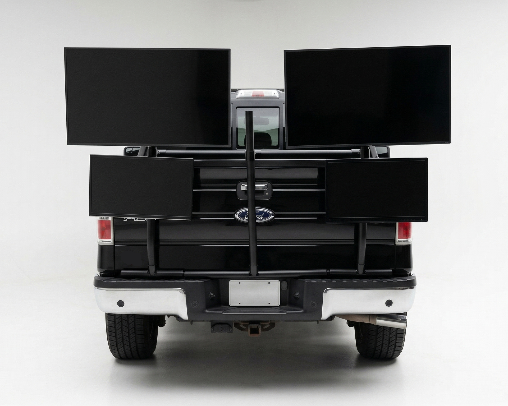 Back of a truck with a black PVC TV platform on a white background