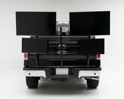 Back of a truck with a black PVC TV platform on a white background