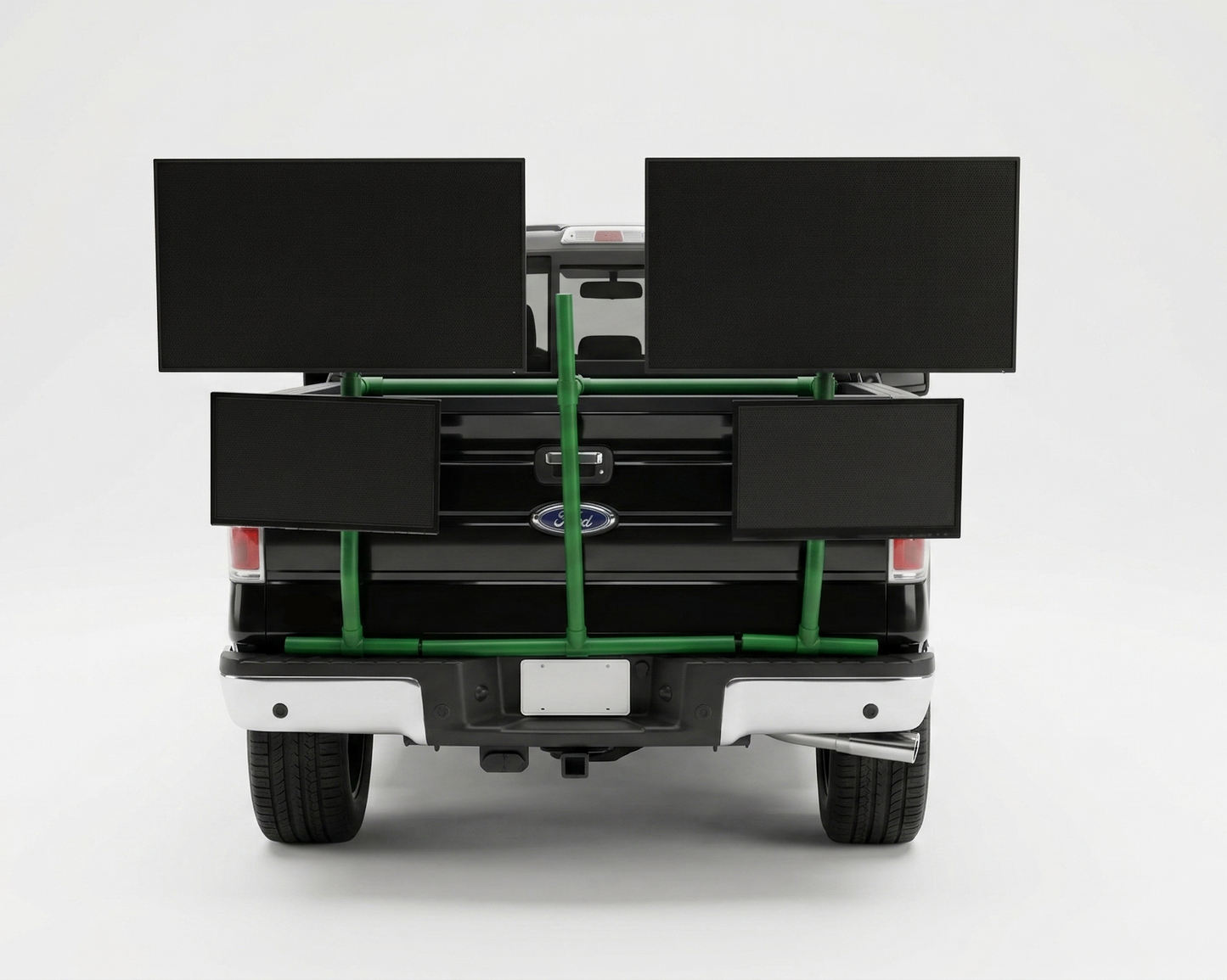 Back of a truck with a green PVC TV platform on a white background