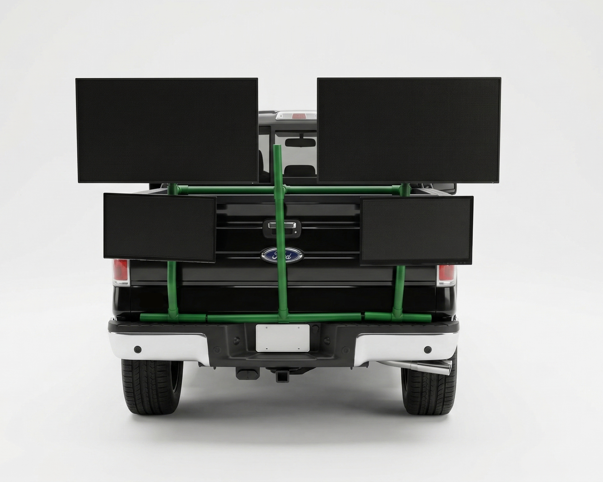 Back of a truck with a green PVC TV platform on a white background