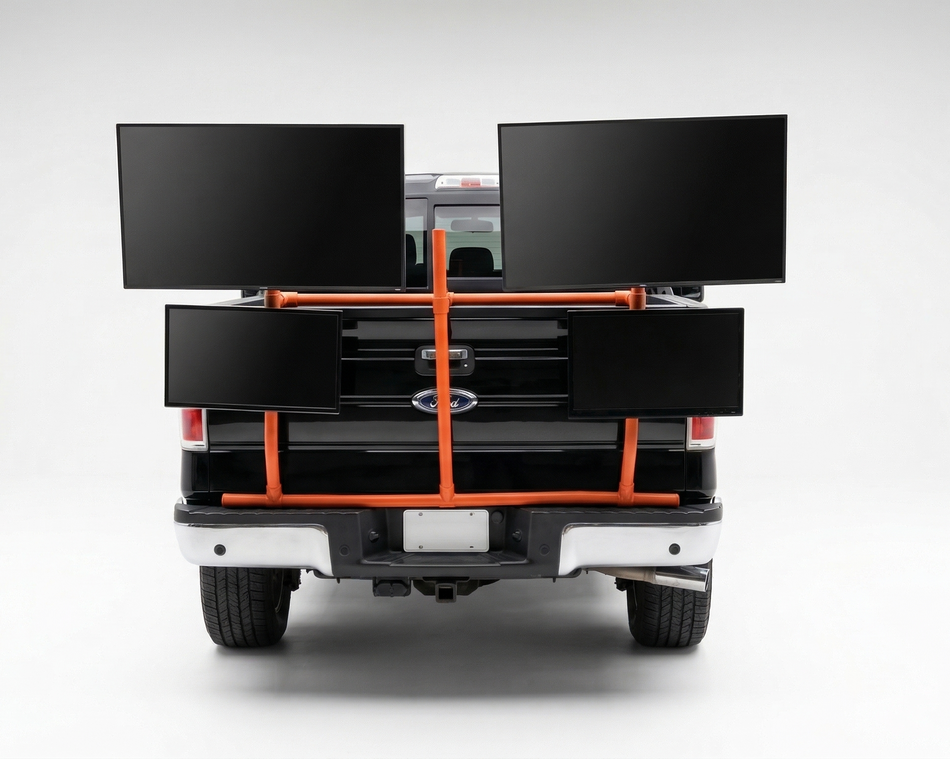 Back of a truck with a orange PVC TV platform on a white background